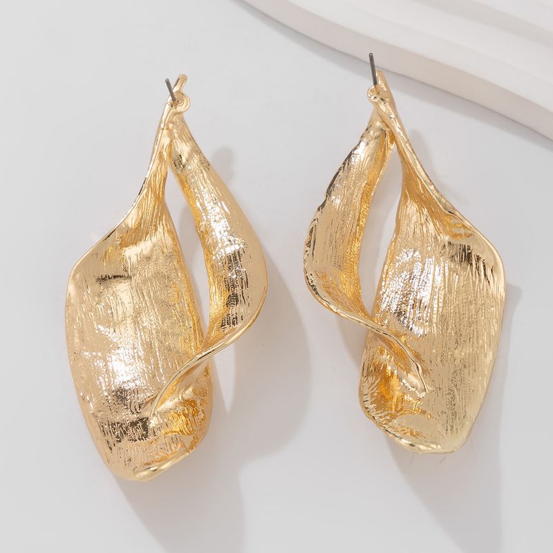 Personality metal geometric texture hollow earrings female irregular twisted glossy earrings earrings_voghion.com