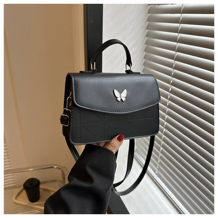 Fransk lyxig handväska i mild stil Butterfly Dekorativ liten väska Dam 2024 Sommar Ny västerländsk stil Crossbody-väska med en axel_voghion.com