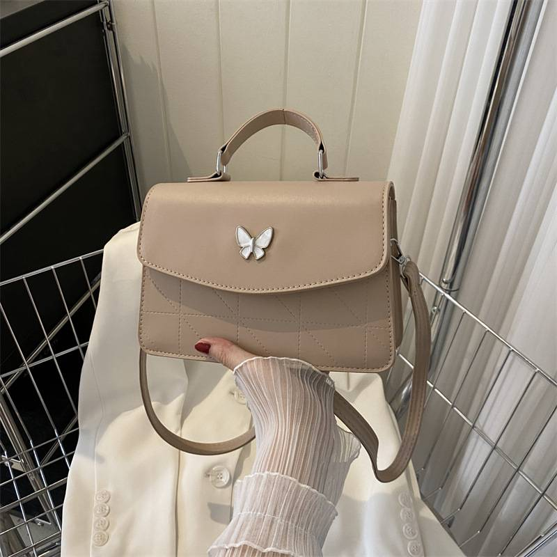 Fransk lyxig handväska i mild stil Butterfly Dekorativ liten väska Dam 2024 Sommar Ny västerländsk stil Crossbody-väska med en axel_voghion.com