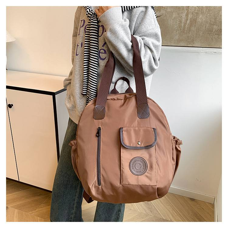 Fashion Advanced One-shoulder Leisure Joker 2025 New Large-capacity Travel Backpack Handbag Simple Tide_voghion.com