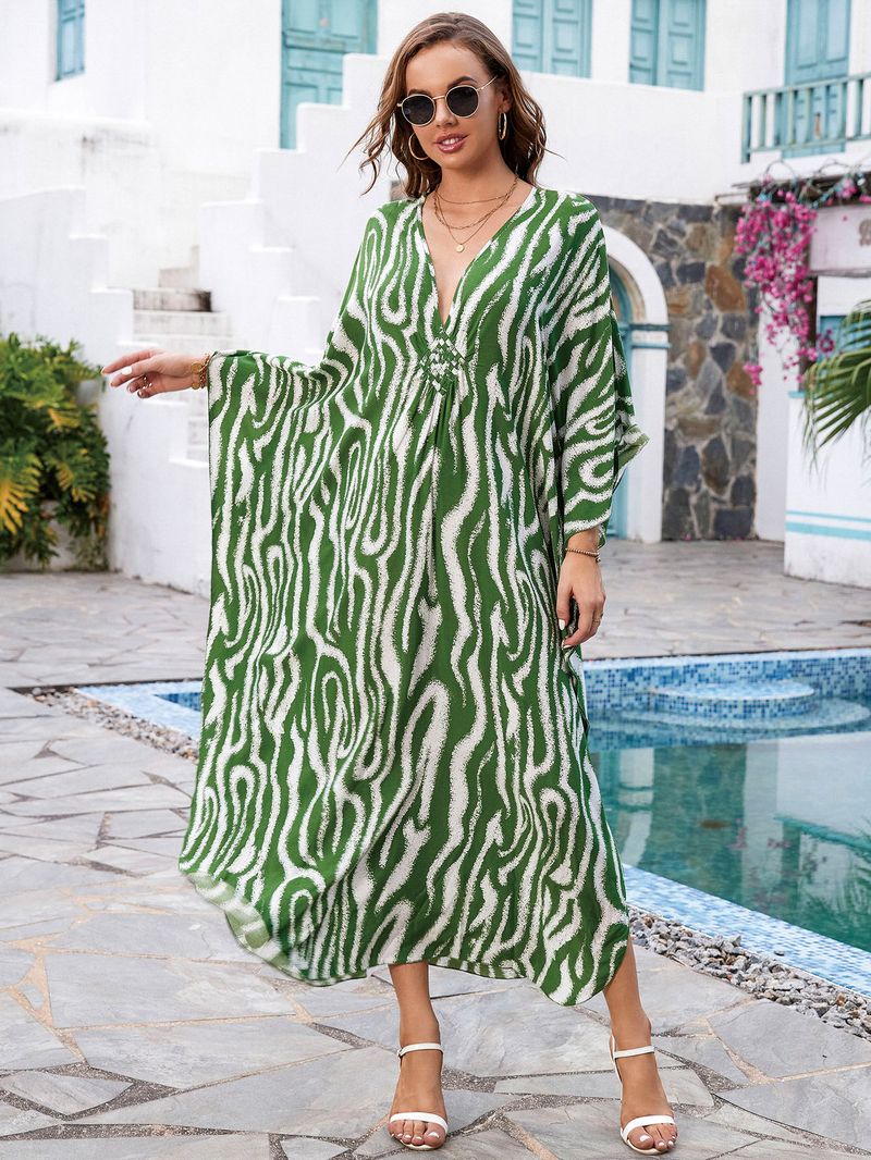 „Strandkleid mit Bohemian-Print – Fließendes langes Kleid für Pool und Urlaub“_voghion.com
