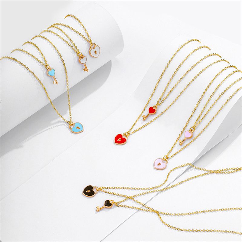 Hot sales 2 pieces, Men's and women's heart-shaped pendants_voghion.com