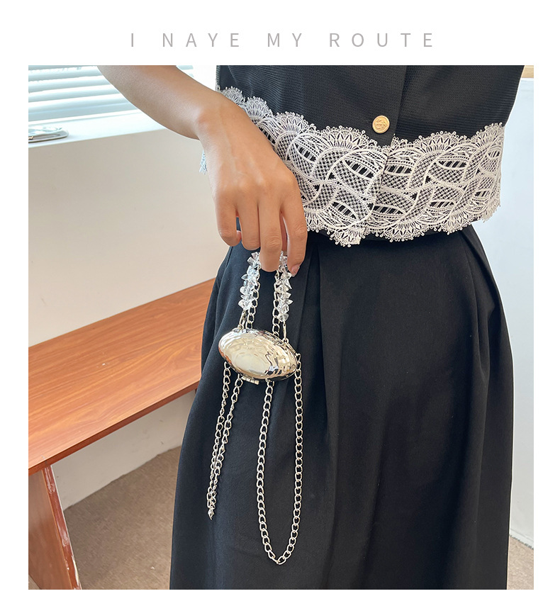 Mini 2024 Été Nouveau sac en coquille d'œuf en métal Sac de banquet de mode européenne et américaine Sac à bandoulière à bandoulière unique Sac pour femmes élégant_voghion.com