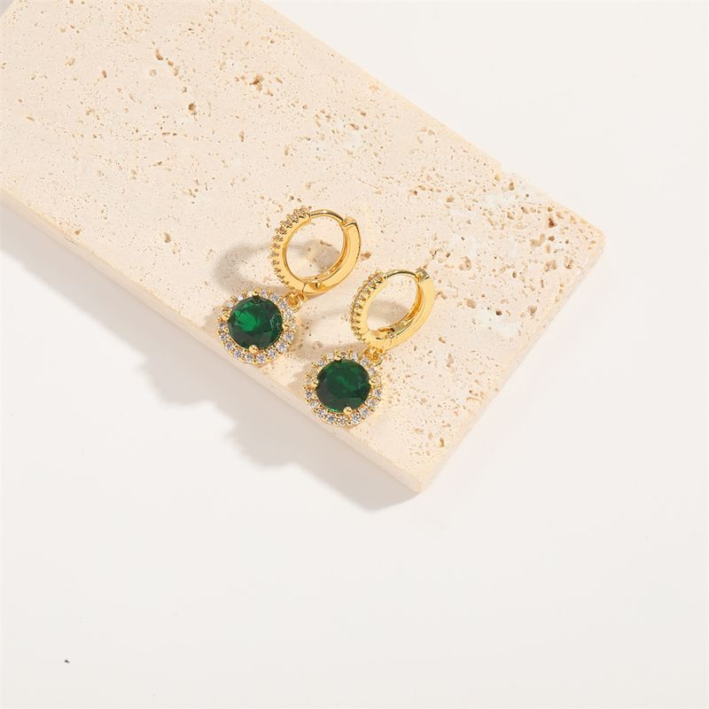 1 paio di orecchini pendenti eleganti e semplici in stile Commute Round Palm Eye con intarsi in smalto e zirconi in rame placcati in oro 14K_voghion.com