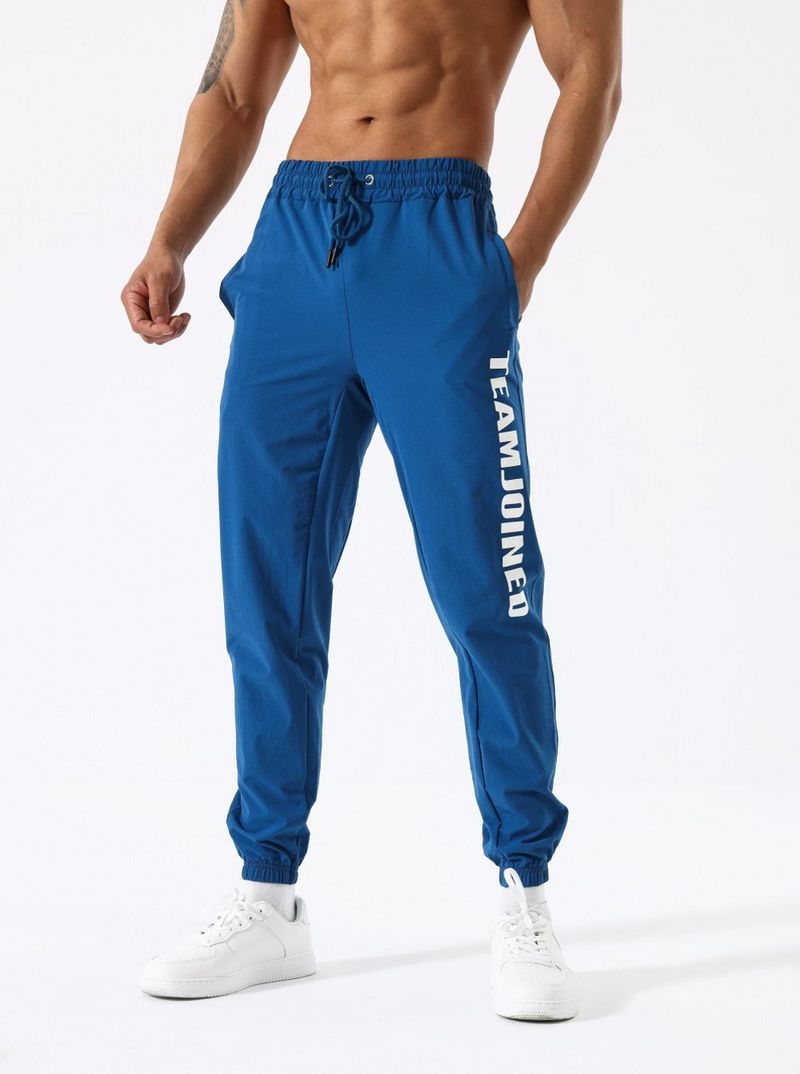 Men's autumn sports trousers nylon four way stretch pants spring and autumn running fitness training loose leggings_voghion.com