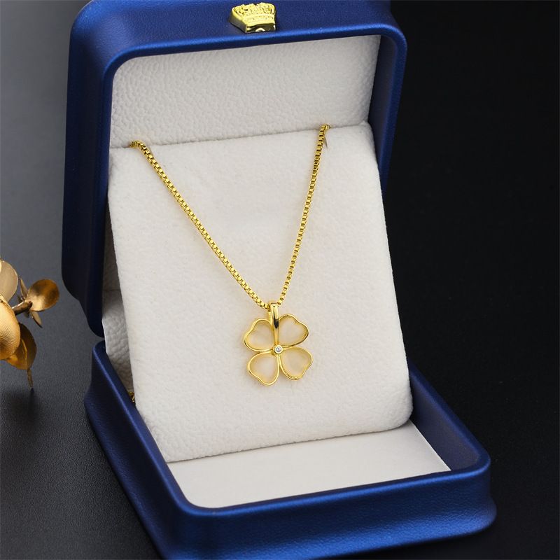 Nuova collana alla moda in acciaio al titanio con trifoglio a forma di fiore dorato con pietra occhio di gatto intarsiata, catena a maglia rossa da donna_voghion.com