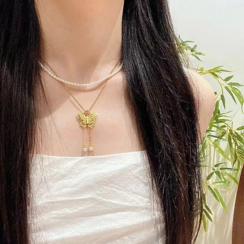 Nuovo Youmeng farfalla smalto farfalla ciondolo sabbia oro perla gioielli lunga durata collana clavicola donne_voghion.com