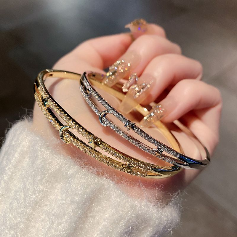 Bracciale con stella luna e zirconi micro-intarsiati, bracciale leggero di lusso placcato oro rame da donna_voghion.com