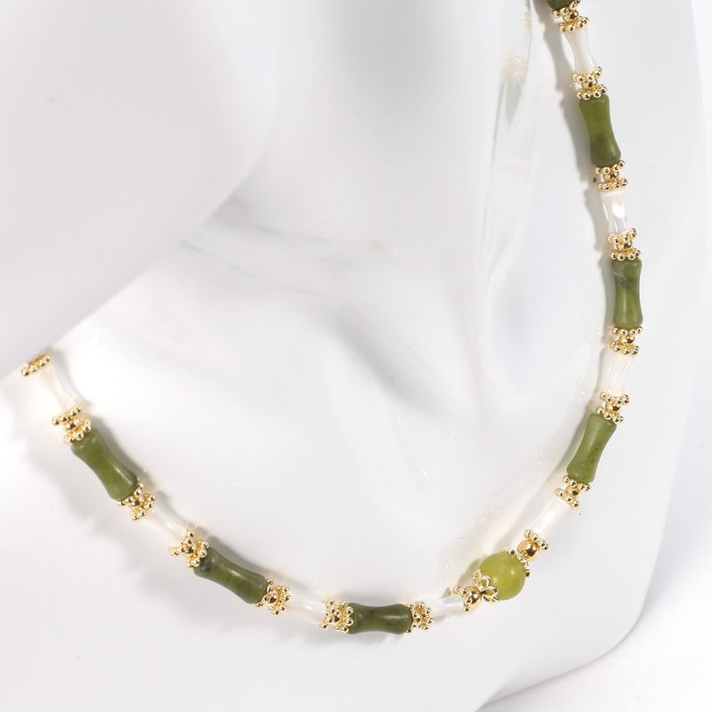 Set di collana con bracciale in pietra naturale con perline rotonde in conchiglia di peridoto di bambù regolabile da donna_voghion.com