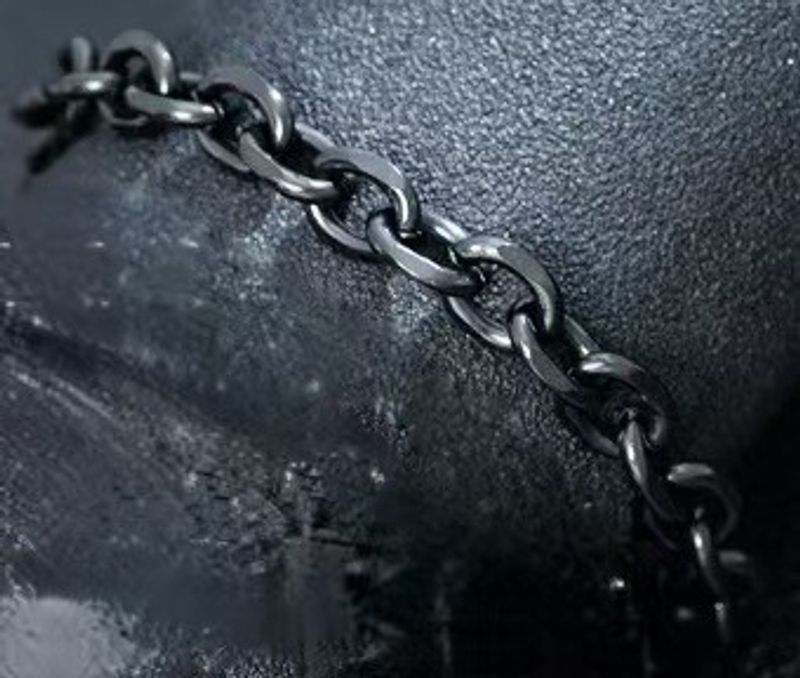Bracciale da uomo in acciaio inossidabile NK nero con catena cubana in titanio intrecciato e chiusura a moschettone Hip Hop Trend_voghion.com