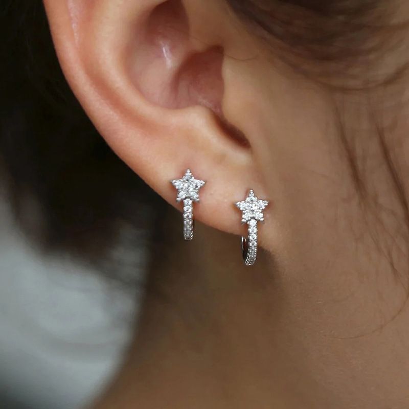 Boucles d'oreilles mignonnes et simples de Cao Shi avec un petit style pour étudiant, accessoires édition coréenne, nouvelles boucles d'oreilles exquises en forme d'étoile_voghion.com