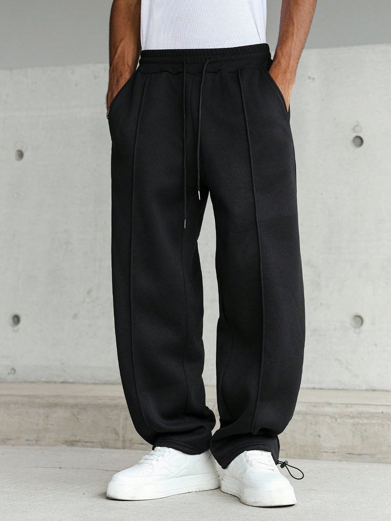 "Men's Oversized Drop-Crotch Joggers – Relaxed Fit Polyester Sweatpants With Elastic Waist & Urban Panel Design (S-2XL, Black & 4 Street Colors)"_voghion.com