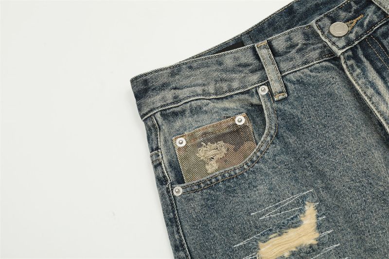 Jeans patchwork mimetici da uomo - Pantaloni a gamba larga con effetto used e cuciture a vista | Collezione Urban Grunge_voghion.com