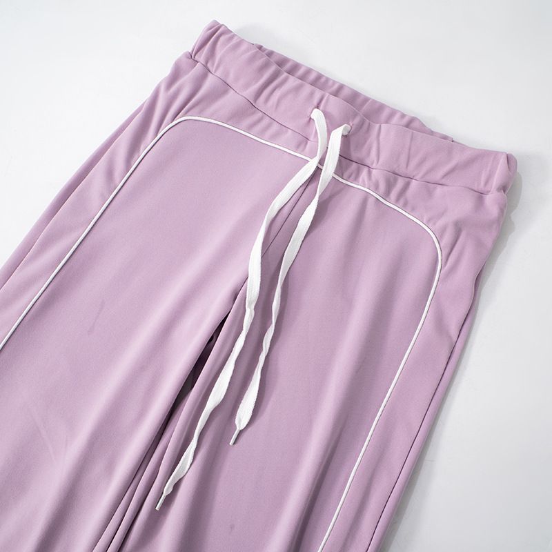 Abbigliamento da donna, linea autunno e inverno, pantaloni a vita alta con elastico in corda, senza colletto, con cerniera, in colori a contrasto_voghion.com