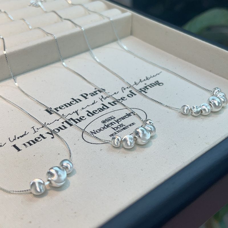 Collana con perline a forma di occhio di gatto in stile INS puro per donna, versione coreana, semplice, leggera, di lusso, in argento_voghion.com