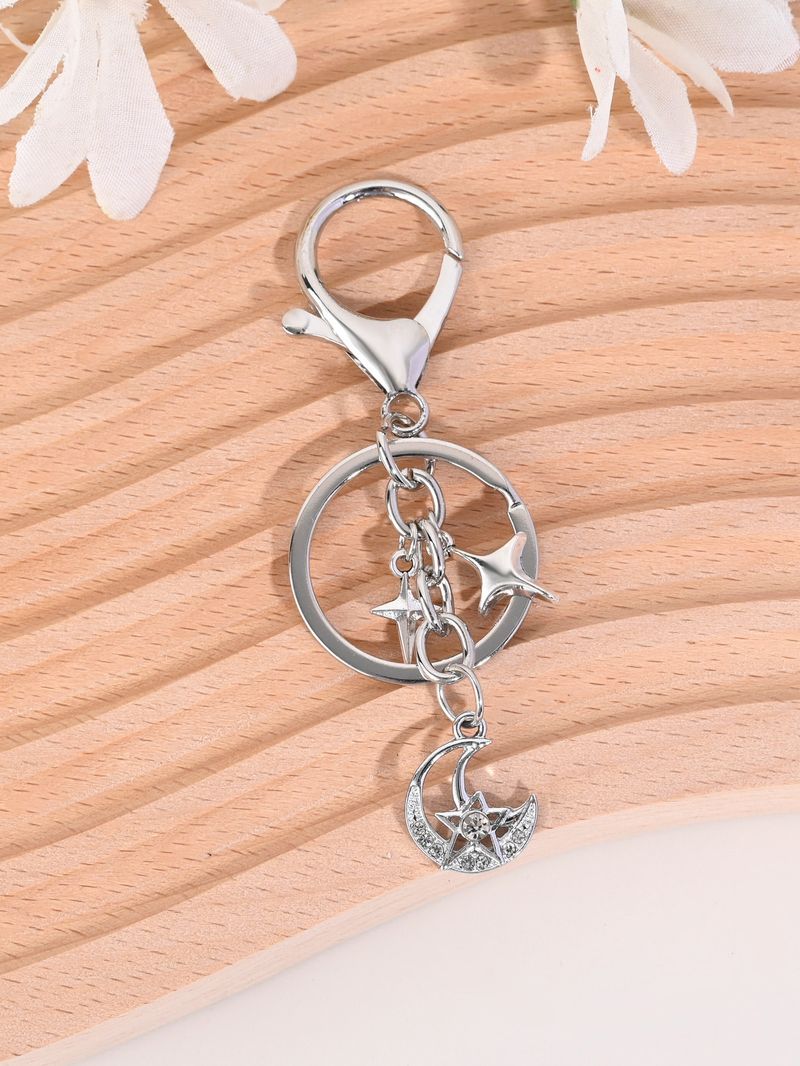 Colgante de llavero para coche con forma de estrella de cuatro puntas, estilo coreano, sencillo, ideal como regalo de San Valentín._voghion.com