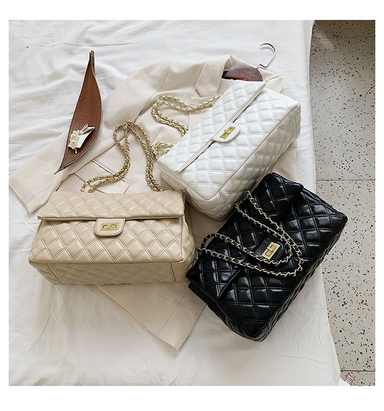 Texture di nicchia in stile designer con un tocco avanzato, piccola borsa con catena a griglia Xiangling, borse da donna trendy con tracolla diagonale a spalla singola_voghion.com