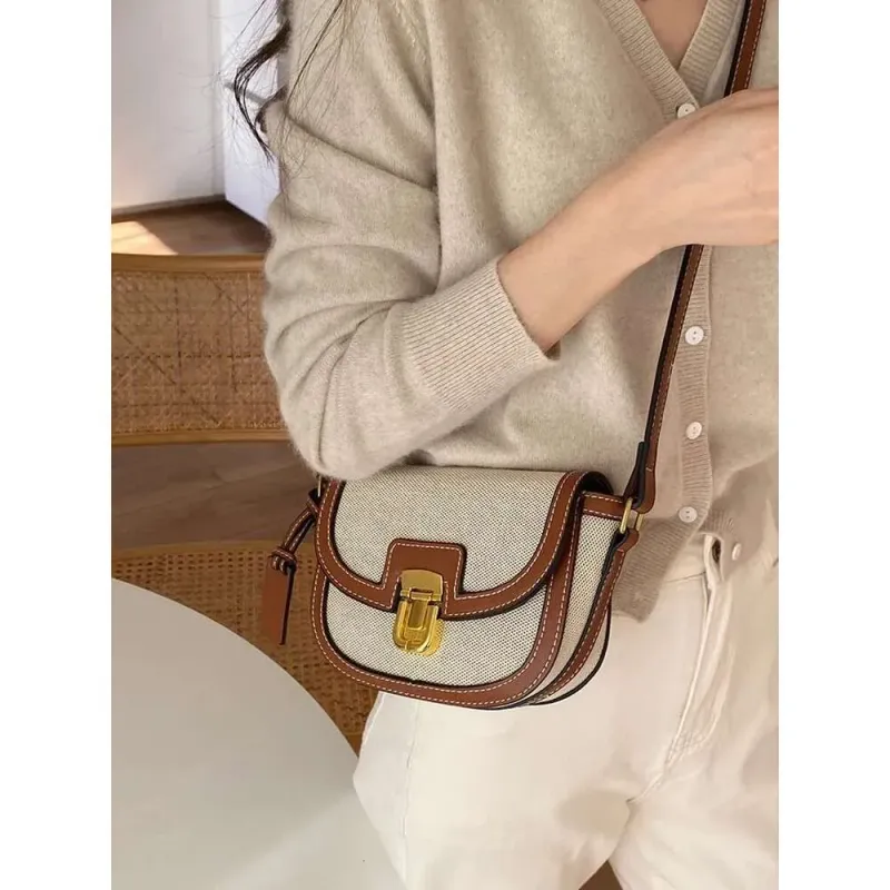 2025 New Small Style Contrast Hot Panel Canvas Retro One Shoulder Crossbody Saddle Bag_voghion.com