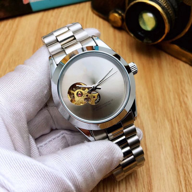 New light luxury men's skeleton automatic gold steel band mechanical watch_voghion.com