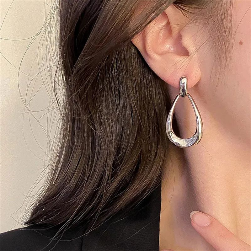 Orecchini in metallo con goccia d'acqua cava di alta qualità, design di nicchia con ago d'argento, orecchini alla moda con temperamento femminile, orecchini leggeri di lusso_voghion.com