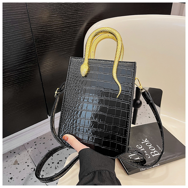 Autumn and winter new network red Korean version of stone personality ins bright face Tote hand bill shoulder crossbody bag_voghion.com