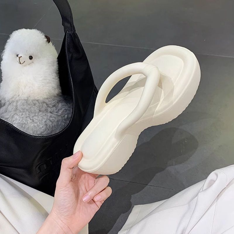 Europese en Amerikaanse slippers met hoge hakken voor vrouwen met dikke zolen om de hoogte en het gevoel van het stappen op stront te vergroten, EVA-slippers_voghion.com