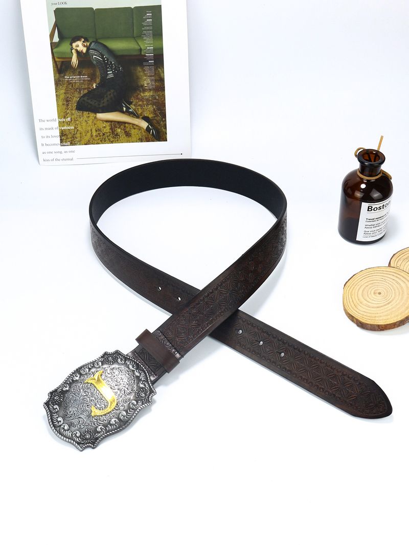 Meeste läänekauboi tähestikuga, suure plaadipandlaga, trendikas noorte retropunk-nahast vöö_voghion.com