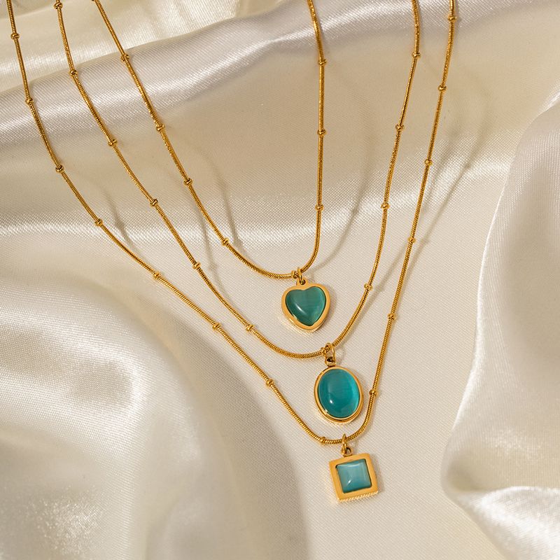Collana da donna con ciondolo quadrato in acciaio inossidabile con occhio di gatto blu, design geometrico alla moda, pezzo minimalista da indossare tutti i giorni._voghion.com