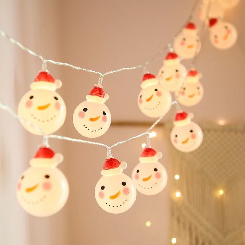 "Catena di luci natalizie a LED con figure di Babbo Natale e pupazzo di neve - Decorazione natalizia a batteria per uso interno/esterno"_voghion.com