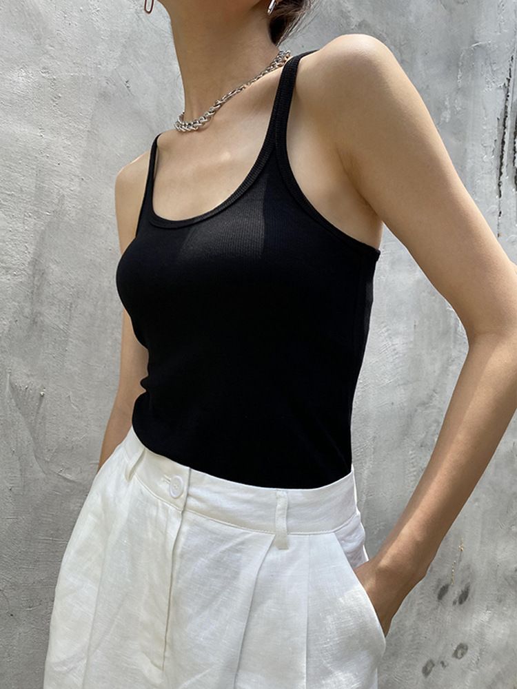 Canotta attillata in maglia con spalline sottili bianche per abbigliamento estivo da donna_voghion.com