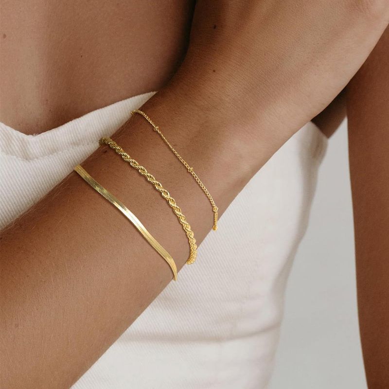 Braccialetto bohémien multistrato regolabile con catena a forma di cuore, stile punk a forma di serpente e osso, con personalità mista_voghion.com