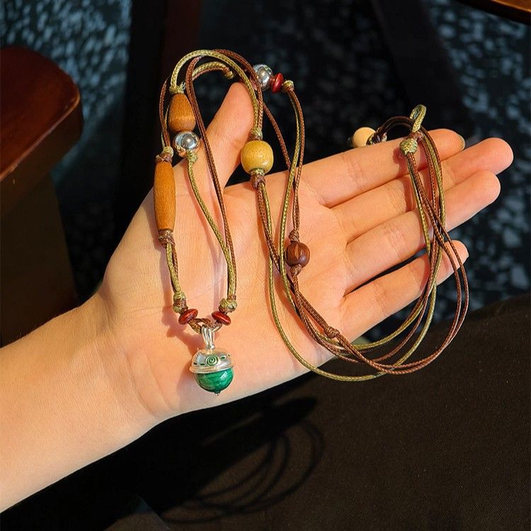 Collana con ciondolo a campana multistrato con perline di legno, corda di cera, stile etnico, design di nicchia, gioielli di senso per_voghion.com