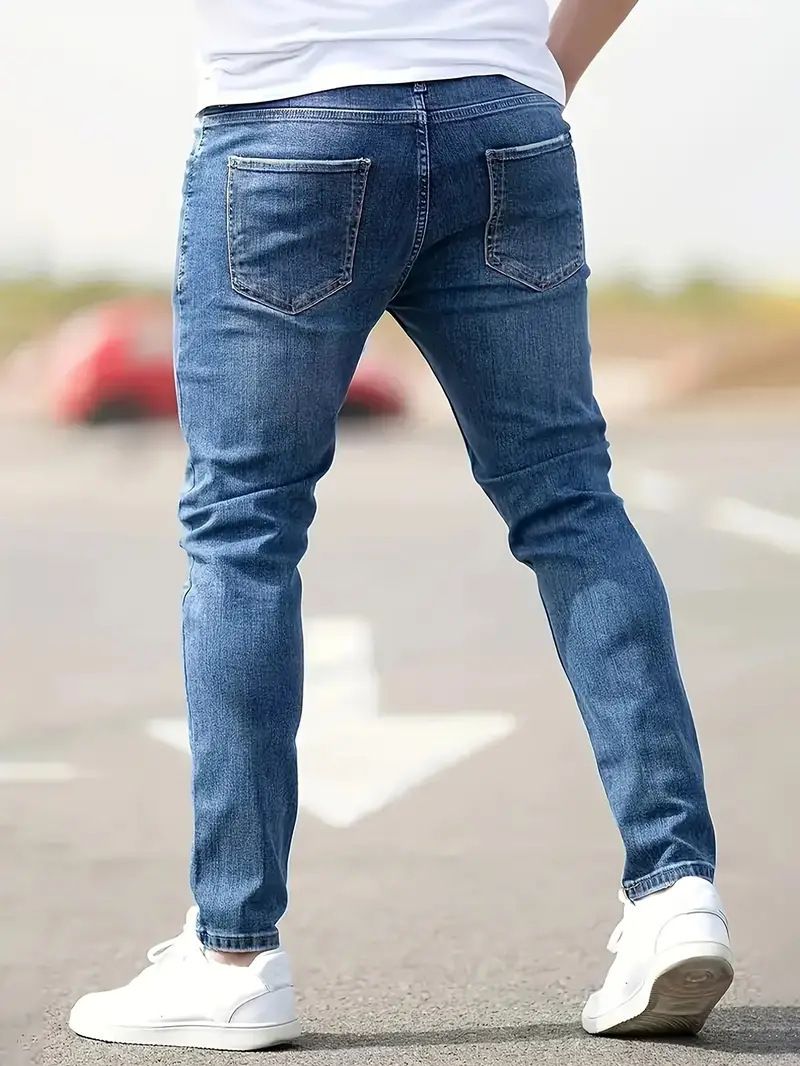 Herenkleding 2025 Europese en Amerikaanse mode Grensoverschrijdende Europese en Amerikaanse heren Small Foot Stretch Ripped Jeans Strakke herenjeans_voghion.com