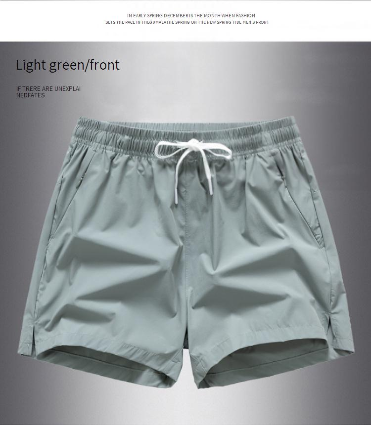 Men's Clothing Fashionable Beach Leisure Solid Color Quick Drying Loose Sports Shorts_voghion.com