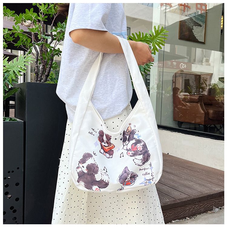 2024 New Spring Outing Dog Shoulder Versatile Large Capacity Canvas Student Commuter Tote Women's Outgoing Bag_voghion.com