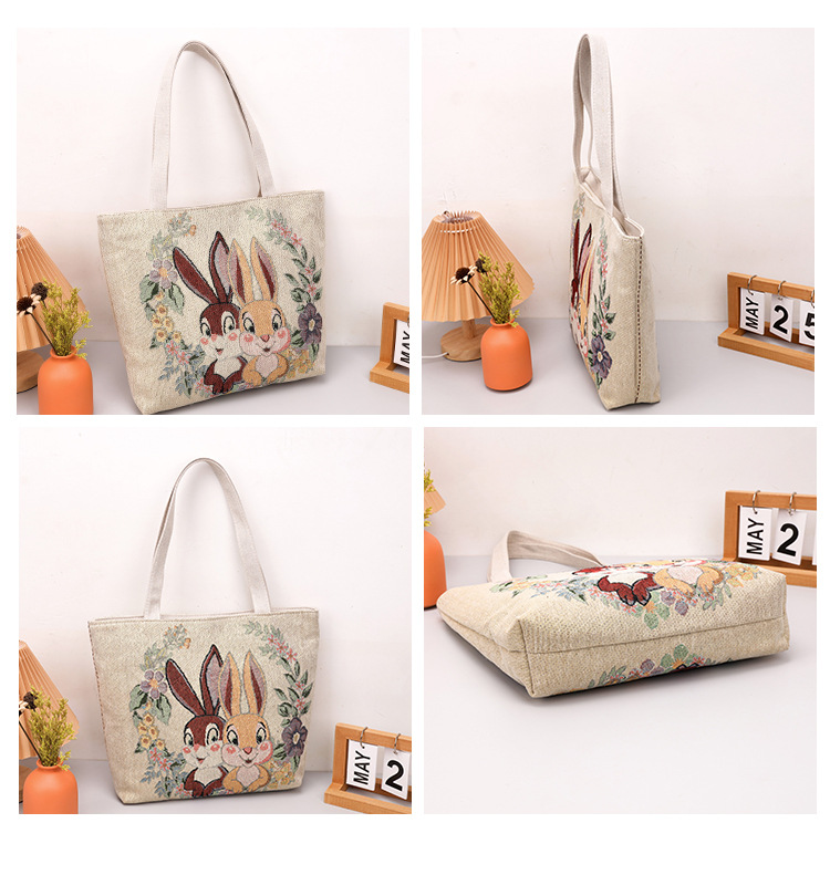 Nuova borsa a tracolla con coppia di elefanti ricamata in jacquard di seta oro bifacciale Borsa da tutor Borsa da pendolare Borsa da ascella_voghion.com