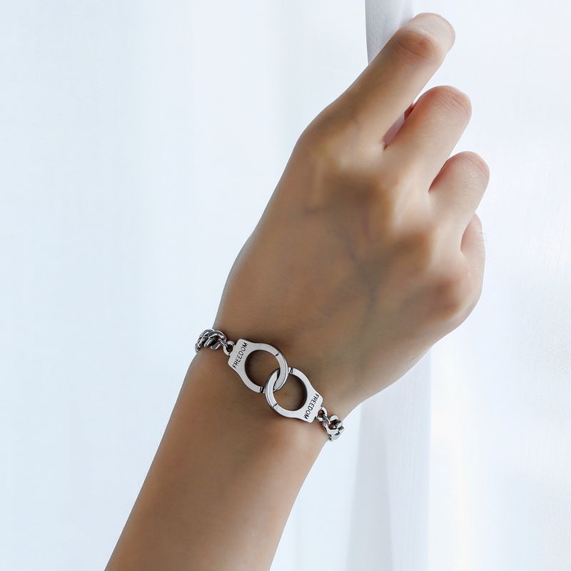 Braccialetto di coppia alla moda con manette in acciaio inossidabile, minimalista, hip-hop, semplice e creativo, con incisione "Freedom"._voghion.com