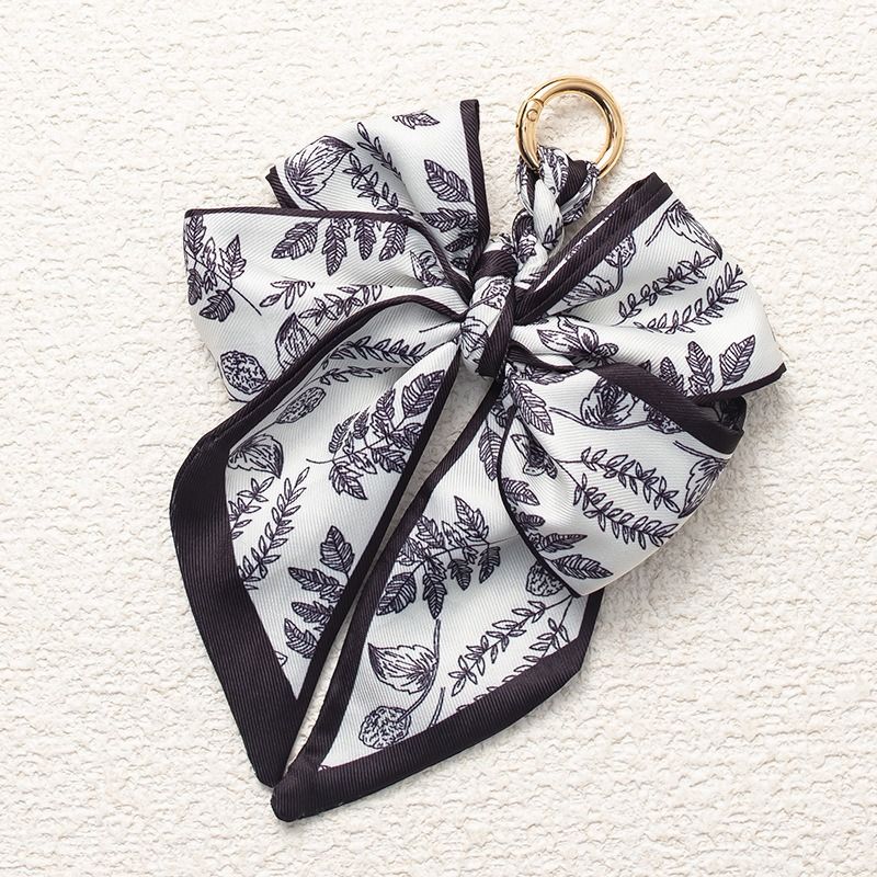 2025 Autumn And Winter Fashion Bag Accessories Keychain Woven Bag Pendant Decorative Bow Bag Pendant Versatile High Sense Retro_voghion.com