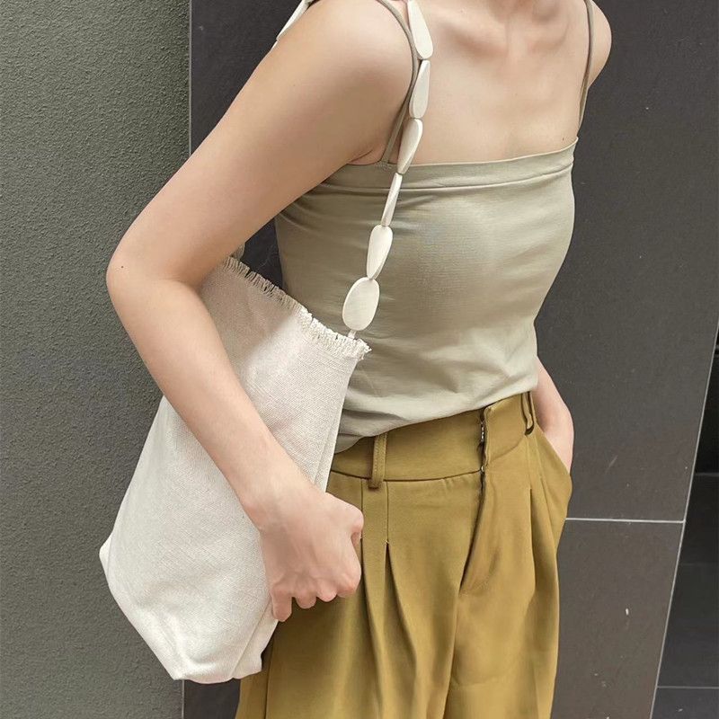 2024 Koreanische Version der vielseitigen Unterarm-Einzelschulterhandtasche mit Nischendesign, handgefertigt mit Rohkantenweberei, einfach_voghion.com
