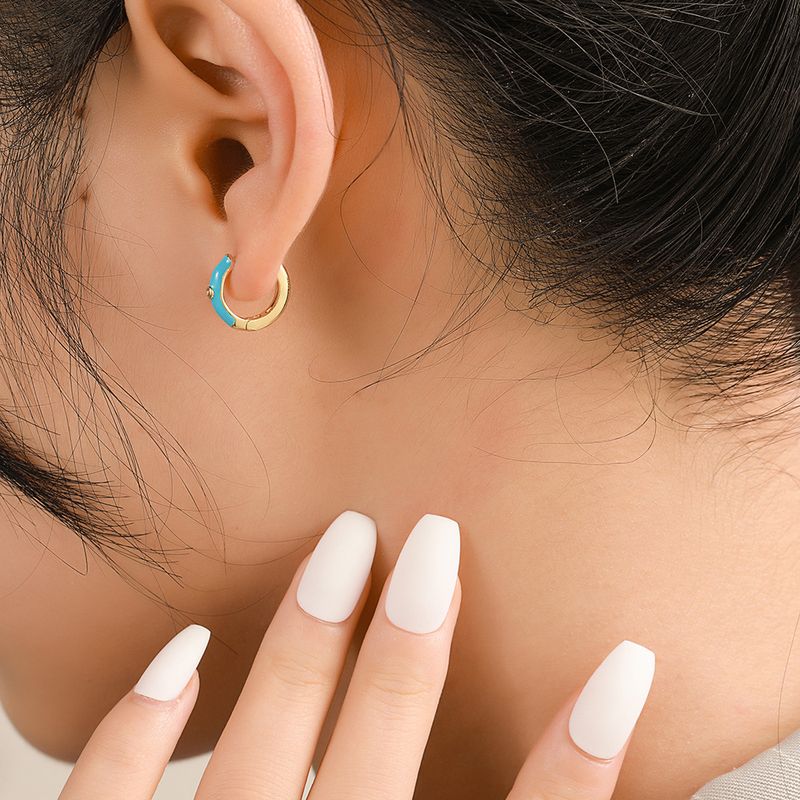 Famosi orecchini a bottone in rame con micro zirconi intarsiati, orecchini a bottone placcati in oro con gocce d'olio per donna_voghion.com