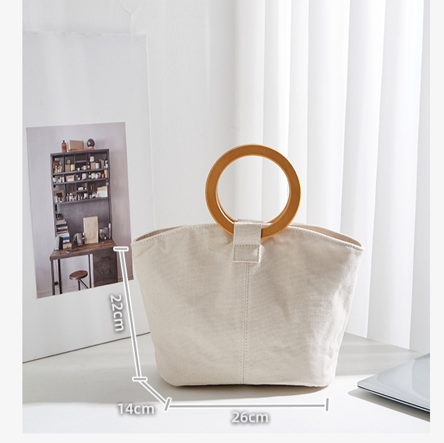 Borsa versatile e di grande capienza in versione coreana, la nuova borsa da donna minimalista in tela di quest'anno, manico in legno_voghion.com