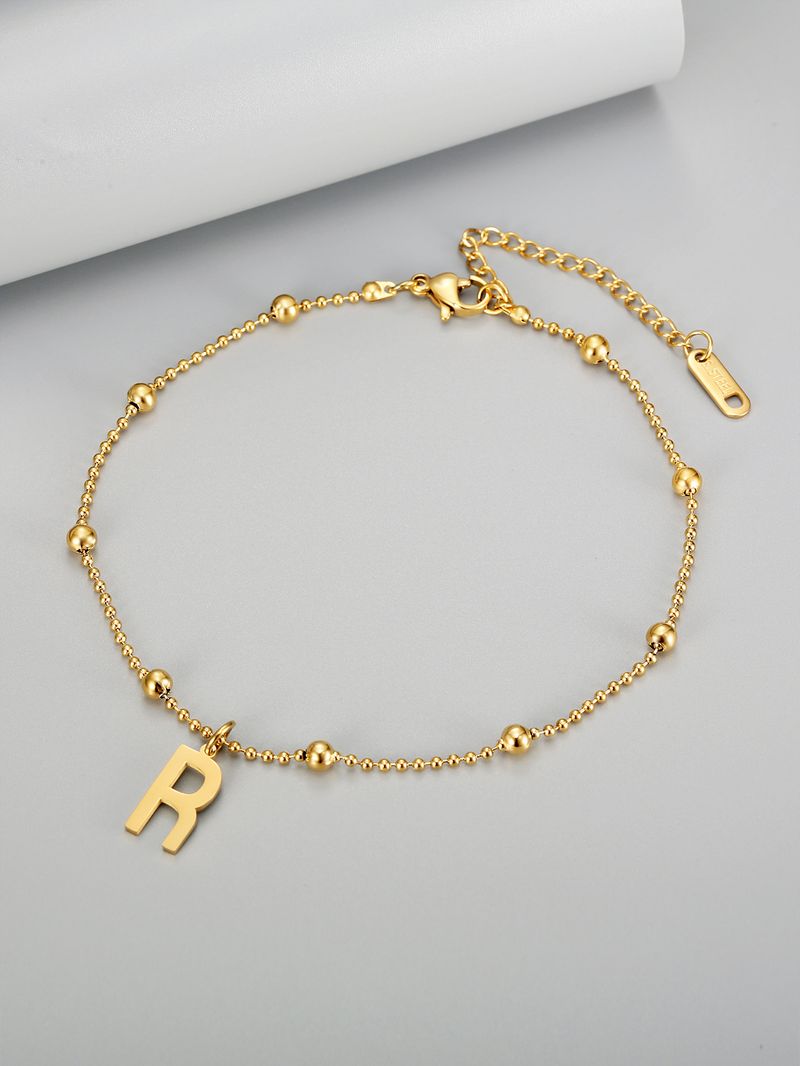 Goldfarbenes Fußkettchen aus Titanstahl für Frauen, INS-Stil, schlichtes und hochwertiges Fußkettchen mit Perlenbuchstaben, Strandfußschmuck_voghion.com