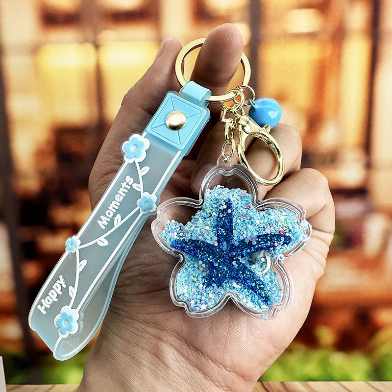 Porte-clés en forme de bouteille flottante de sable liquide, étoile de mer en fleur de cerisier, célébrité Internet, petit pendentif créatif en forme de cœur féminin_voghion.com