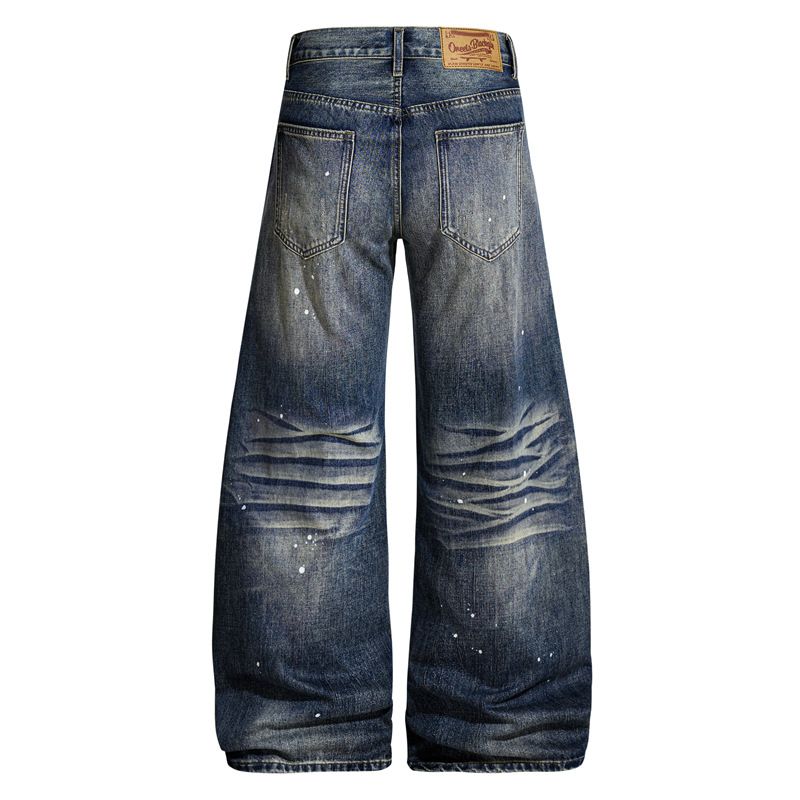 Jeans patchwork streetwear: denim oversize effetto consumato con tasche ricamate e orlo grezzo per un tocco urbano_voghion.com