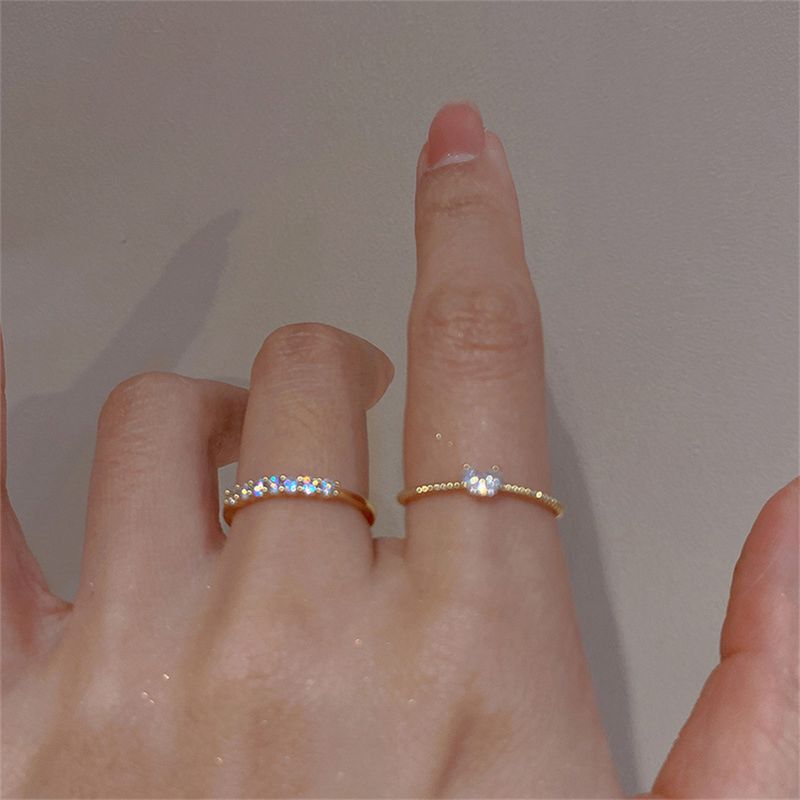 2025 Nuovi arrivi 2 pezzi anelli a forma di cuore in cristallo delicato ed elegante per donne e ragazze color oro, set di anelli per dita delicati e impilabili_voghion.com