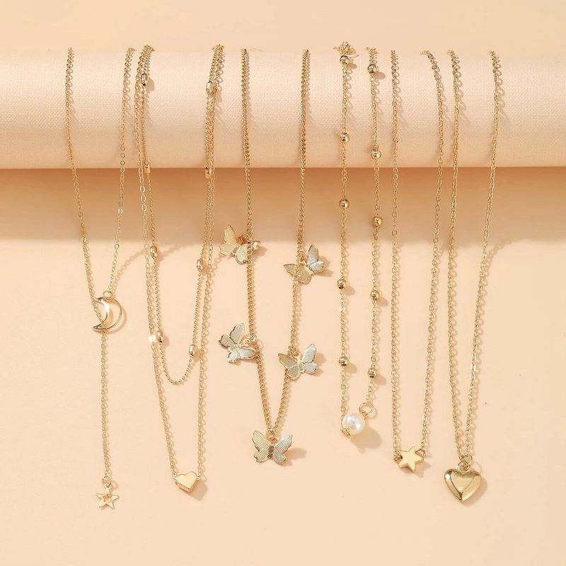 Hot selling alloy set, creative and personalized multi-layer butterfly pendant, 6 pieces of moon peach heart necklace_voghion.com