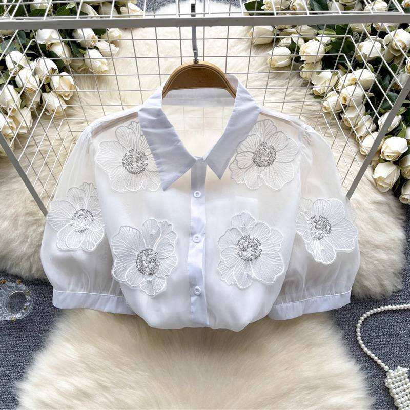Camicetta floreale con paillettes e perline da donna_voghion.com
