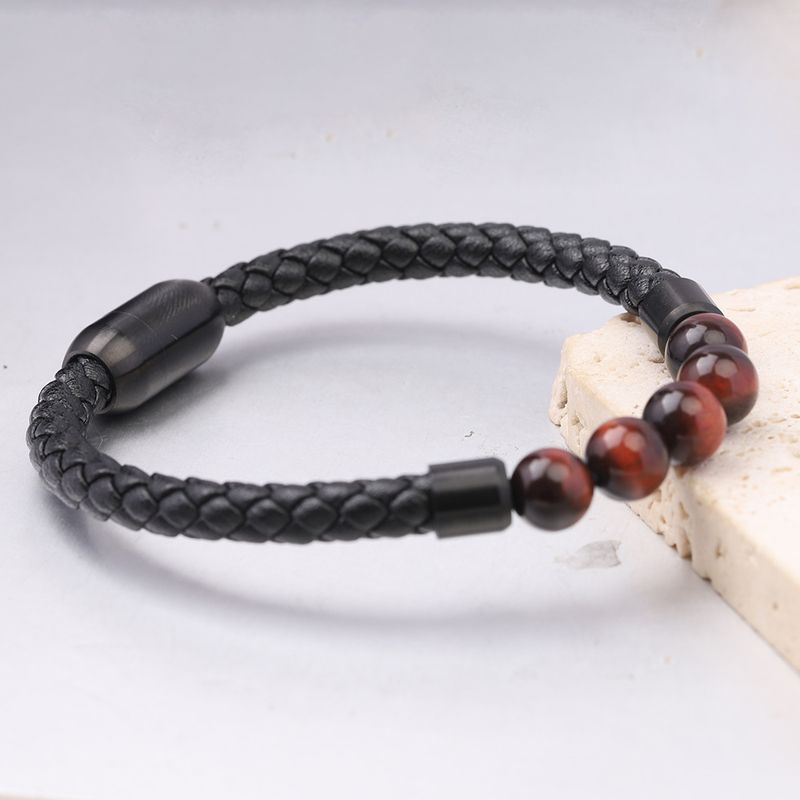 Pulsera trenzada de cuero vacuno con cierre magnético de ojo de tigre para hombre y mujer._voghion.com