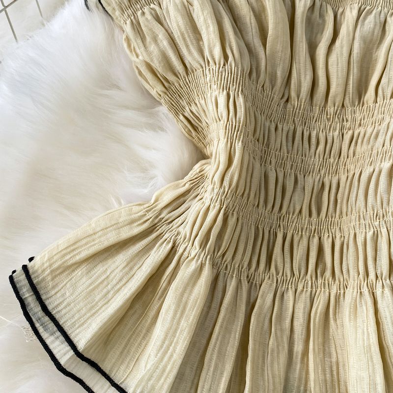 Completo due pezzi da donna con top snellente con spalline scoperte e vita elasticizzata a pieghe + gonna a balze a vita alta_voghion.com