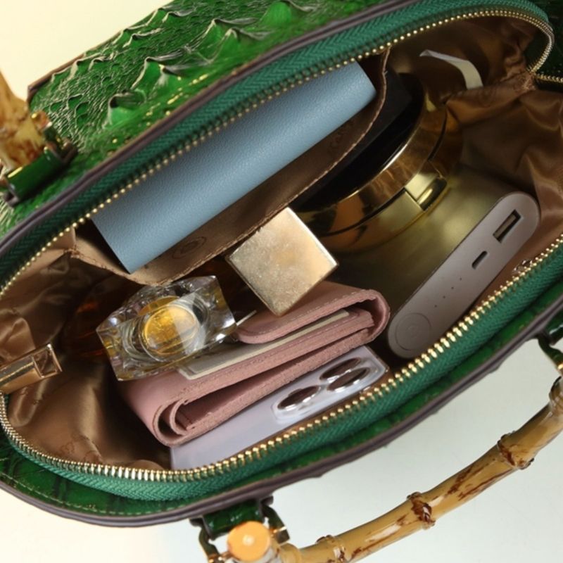 Hard skin women's bag 2024 new fashionable bamboo section handbag atmospheric niche design shell shoulder cross_voghion.com